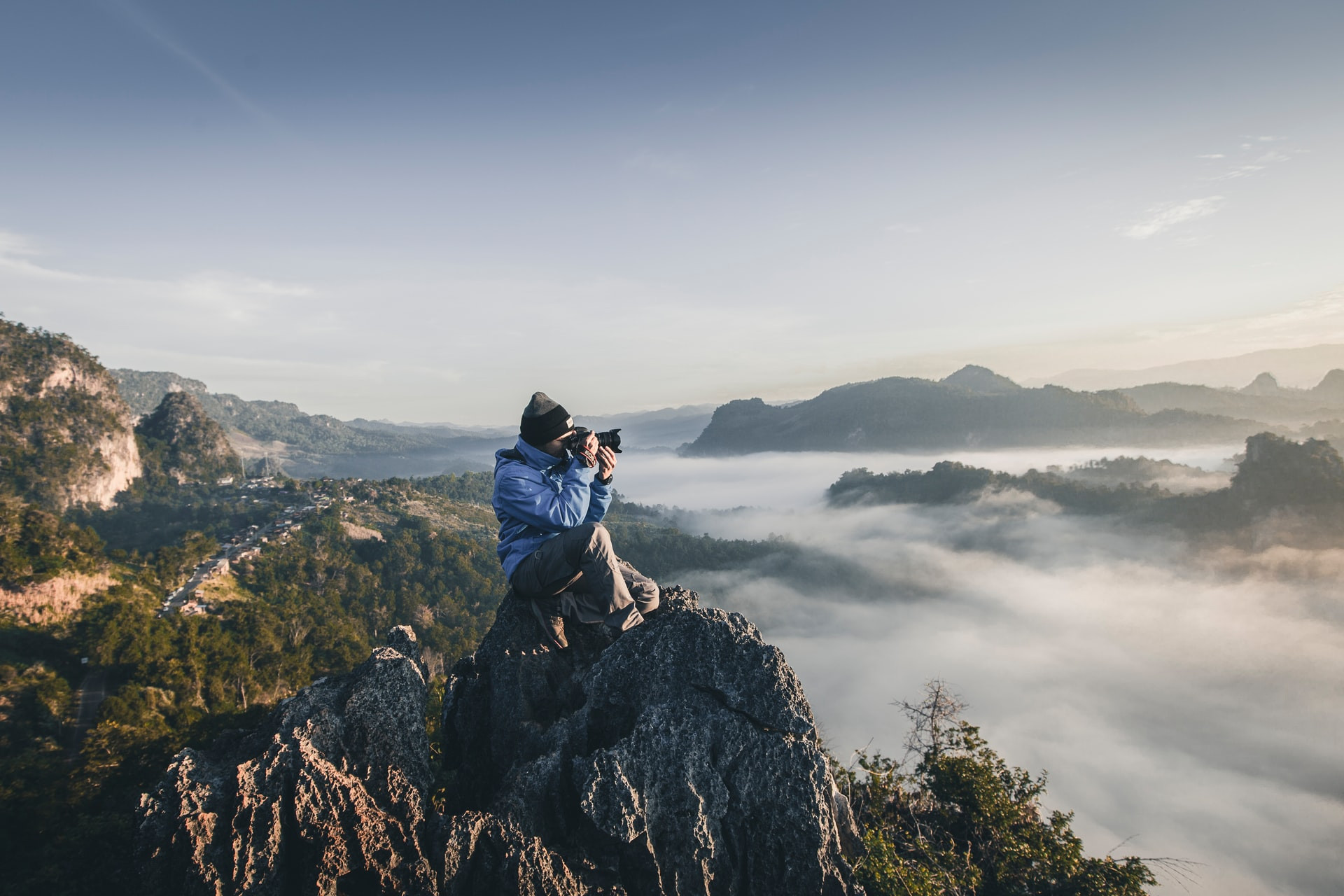 person is photographing mountains